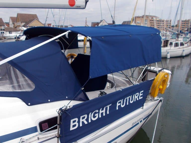 Bavaria 39 Cruiser Bimini shown with optional zip attached Side Shade Curtains