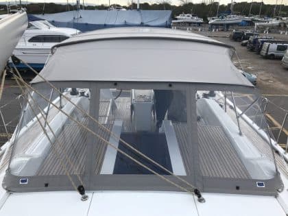Beneteau Oceanis 51.1, model with NO ARCH, Bimini and zipped Sprayhood Connector front 4 Shown with Tecsew Bimini and zipped connector to Sprayhood