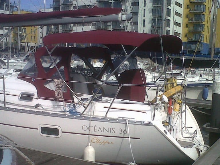 Beneteau Oceanis 361, 4 bar bimini extended aft of backstays