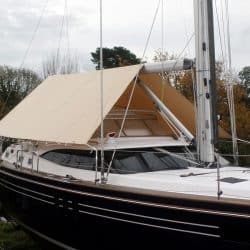 Tecsew boom tent fitted on a yacht, offering cockpit protection with premium marine fabric and custom fit.