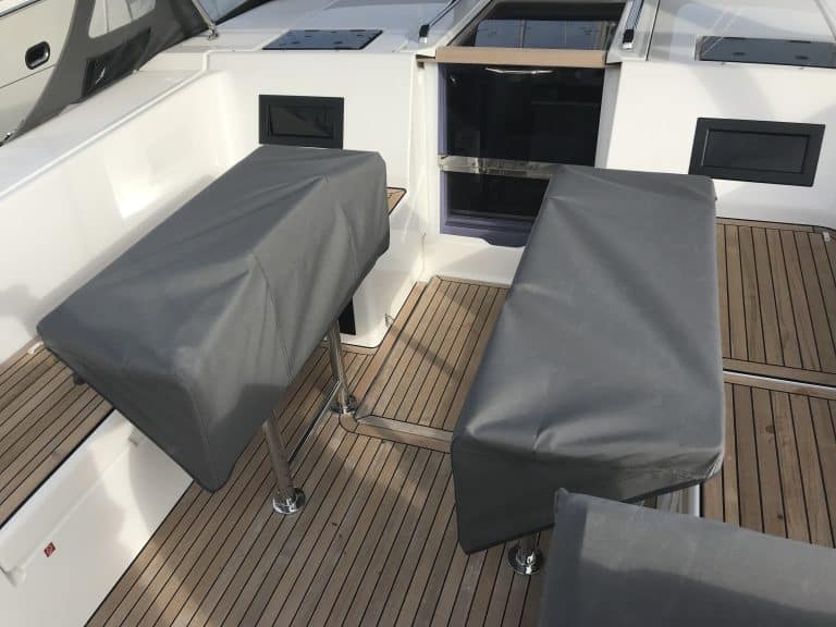 Bavaria Cruiser 45 Style Table Covers with hand rails covered