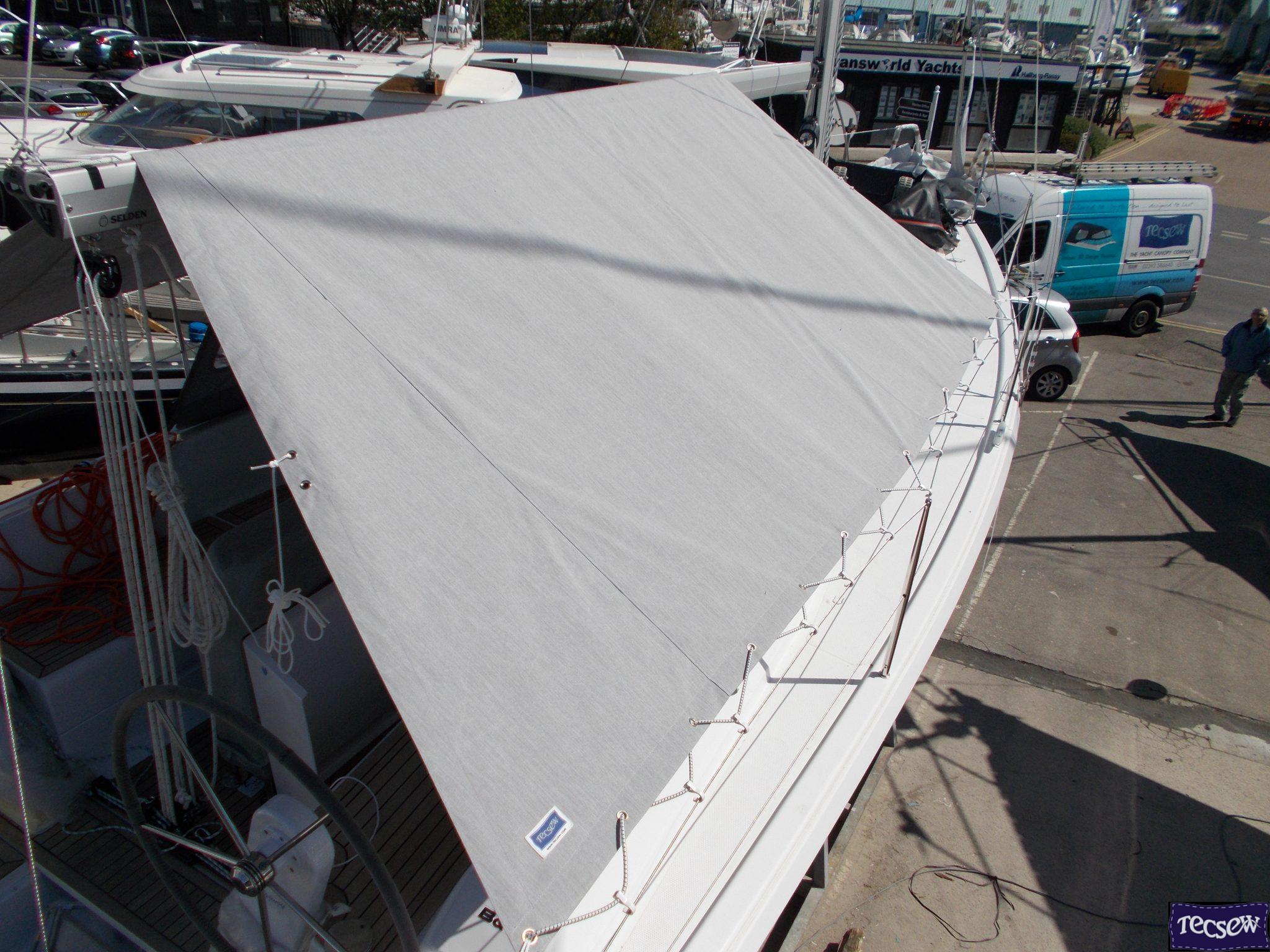 Close-up of durable marine fabric and expert stitching on Tecsew boom tent, ensuring performance in harsh conditions.