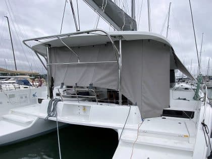 Lagoon 42 with custom cockpit shade panels installed, providing sun protection and versatility.