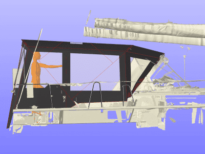 Dufour 41 with a fully installed bimini conversion-enclosure offering complete cockpit protection.