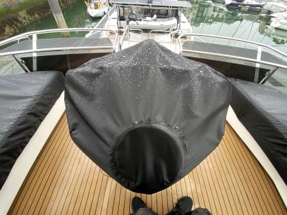 Aquila 44 seating and console covers crafted with TopNotch 1S fabric for lightweight and durable protection.