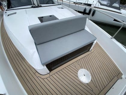 Moody 48 DS bow seating and backrest with optional contrast piping for style and comfort.