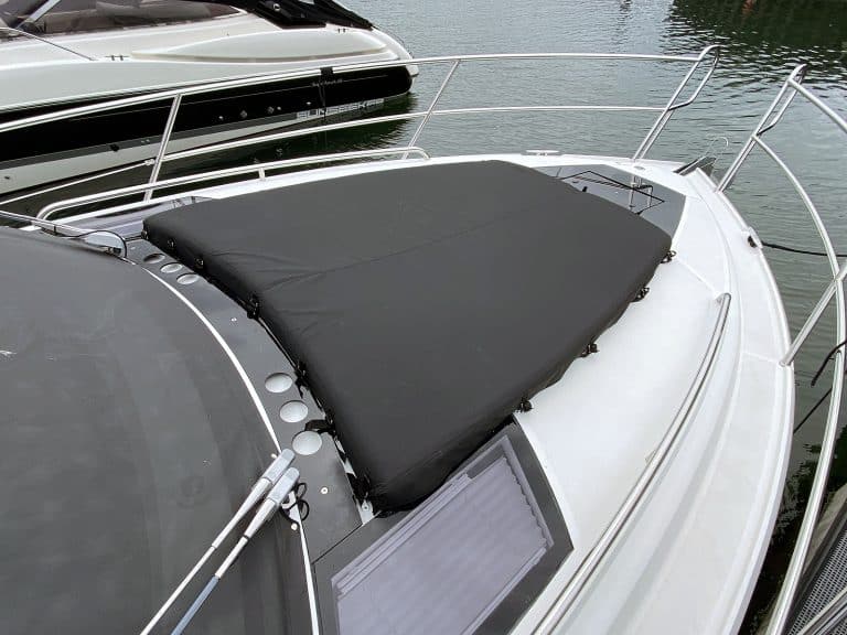Galeon 335 HTS bow seating cover in Sunbrella fabric for weather and UV protection.