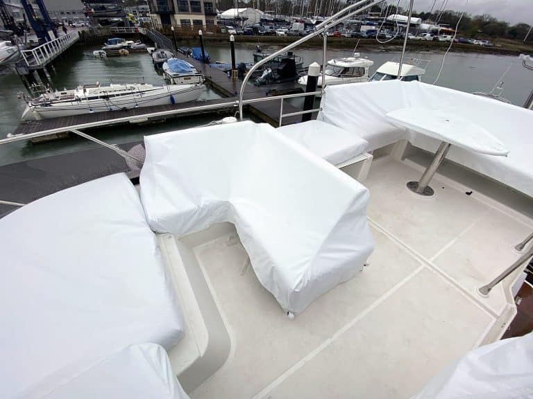Jeanneau Prestige F4 flybridge seating and console covers by Tecsew.